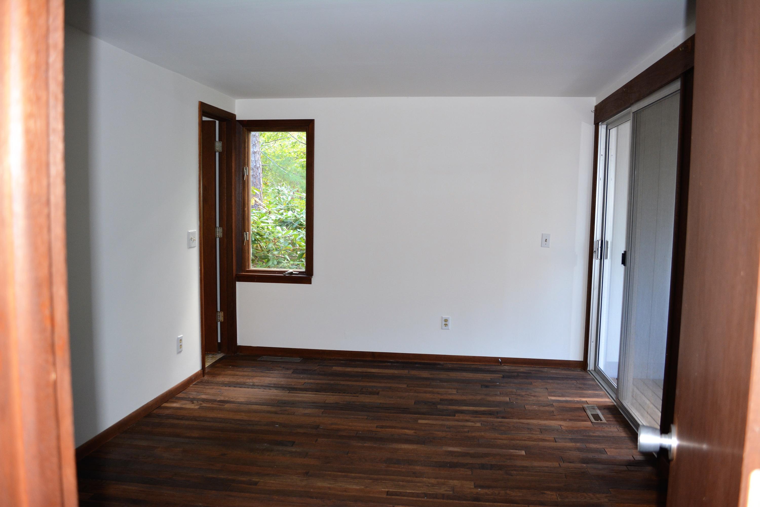 76 Summersea Road Mashpee, MA 02649 - Photo 11 of 24 a view of an empty room with wooden floor and a window
