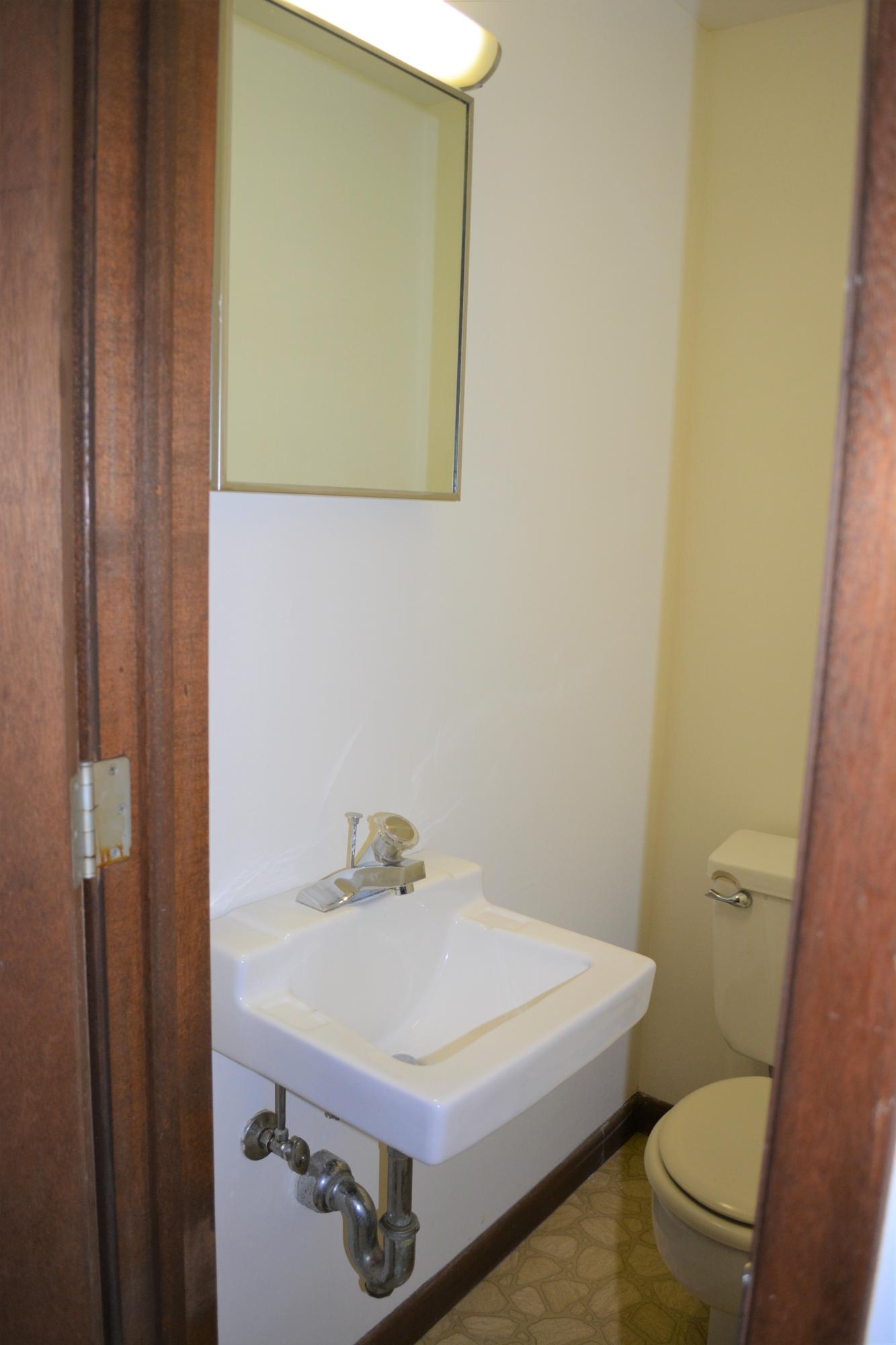 76 Summersea Road Mashpee, MA 02649 - Photo 14 of 24 a bathroom with a sink a toilet and a mirror