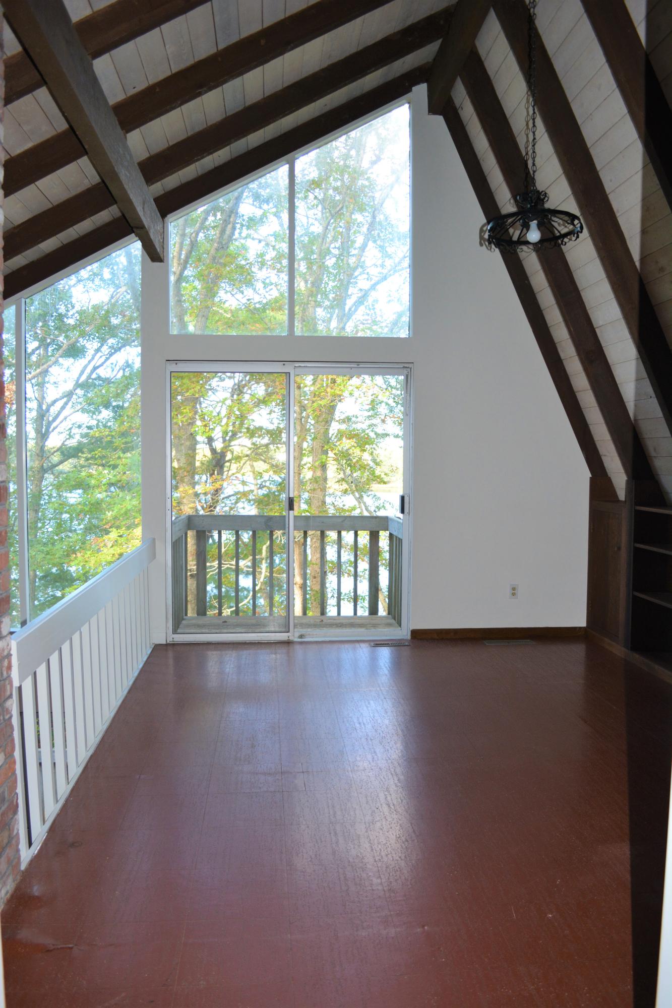 76 Summersea Road Mashpee, MA 02649 - Photo 19 of 24 wooden floor in an empty room with a window