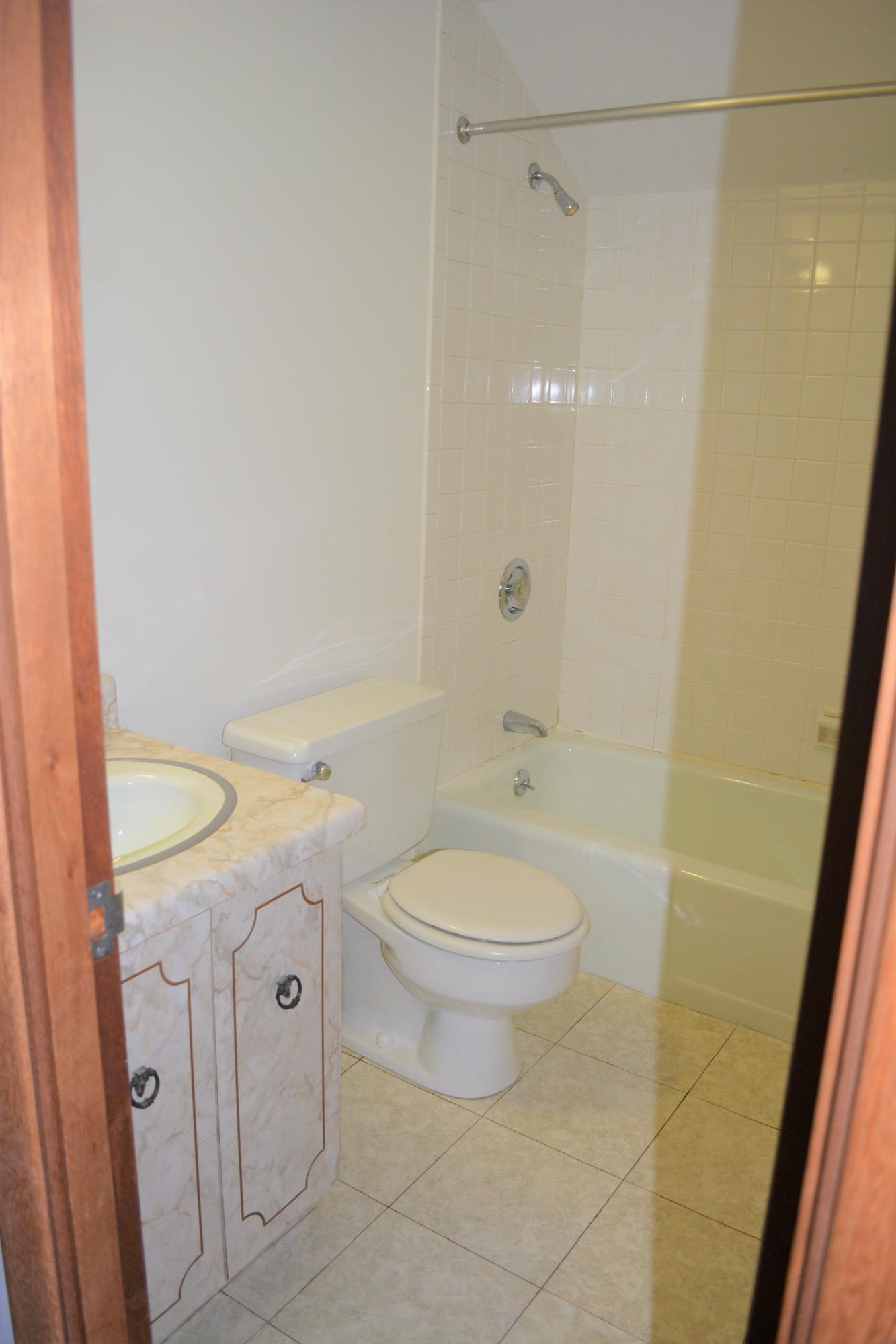 76 Summersea Road Mashpee, MA 02649 - Photo 21 of 24 a bathroom with a granite countertop sink toilet and shower