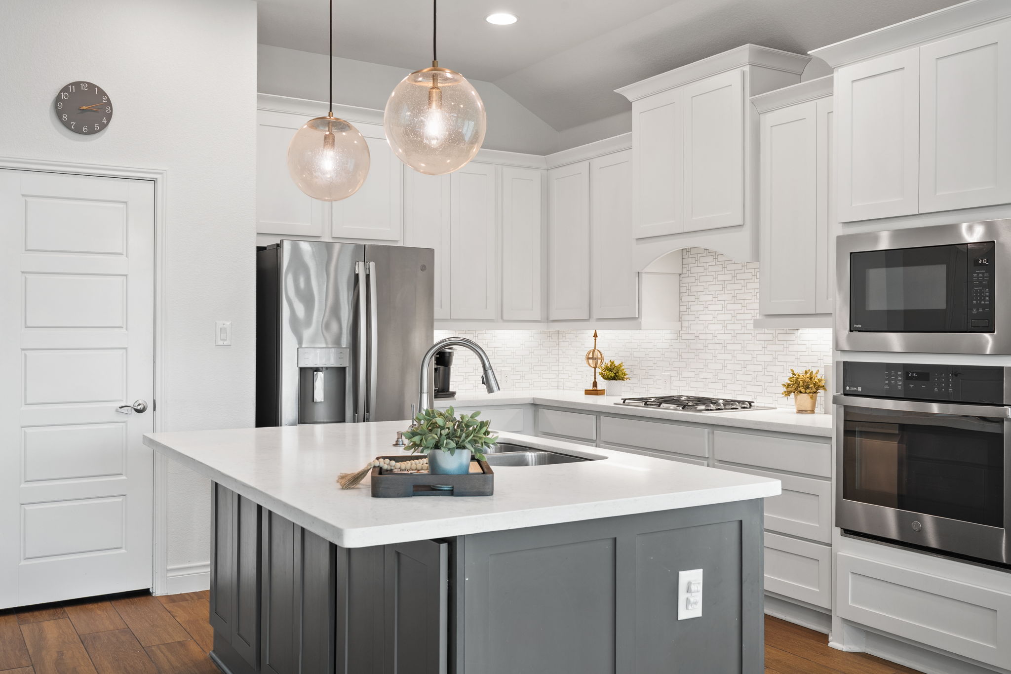 1908 Woolsey Way Leander, TX 78641 - Photo 6 of 36 Culinary delights await in this bright kitchen with stainless steel appliances.