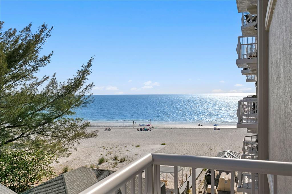 19730 Gulf Boulevard, Unit 400 Indian Rocks Beach, FL 33785 - Photo 54 of 90 a view of a balcony with an ocean view
