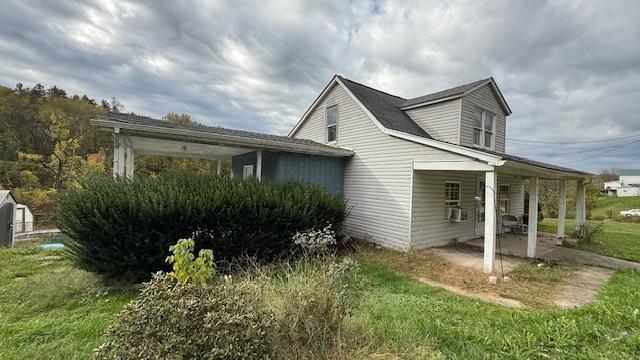 a backyard of a house with lots of green space