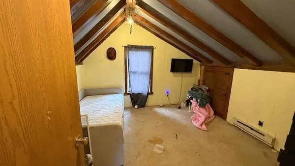 a room with a sink a washer and dryer