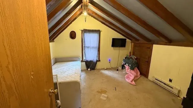 a room with a sink a washer and dryer