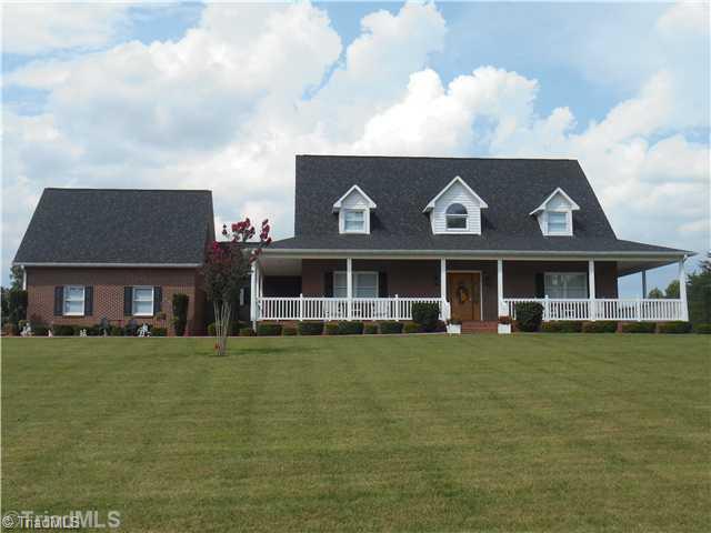 3613 Quaker Church Road Pinnacle, NC 27043 - Photo 16 of 16 Exterior Front. Bring on the horses! Bring on the cows! The pond has fish! The house has a view! It s only waiting for YOU!