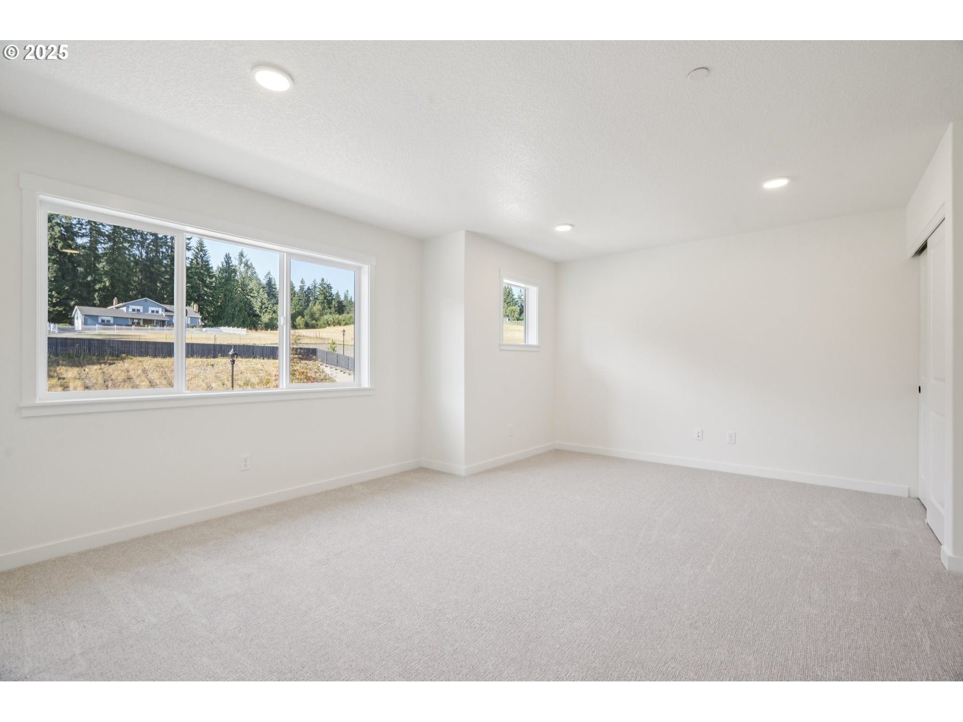 410 West 20th Way La Center, WA 98629 - Photo 24 of 43 a view of an empty room with a window