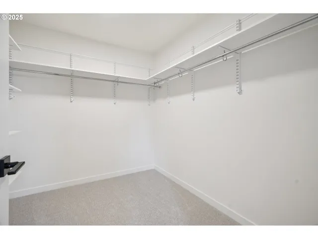 a view of an empty walk in closet