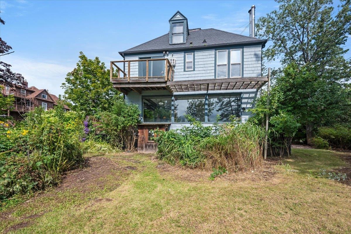 5130 London Road Duluth, MN 55804 - Photo 5 of 45 Rear view of house featuring a yard