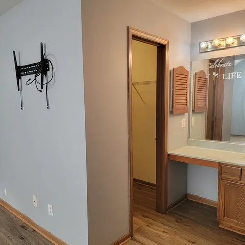 a view of a hallway with workspace