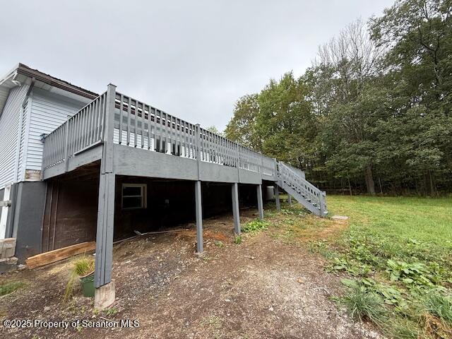 53 Elkview Drive, Unit 985 Forest City, PA 18421 - Photo 7 of 38 a view of a house with a backyard and porch