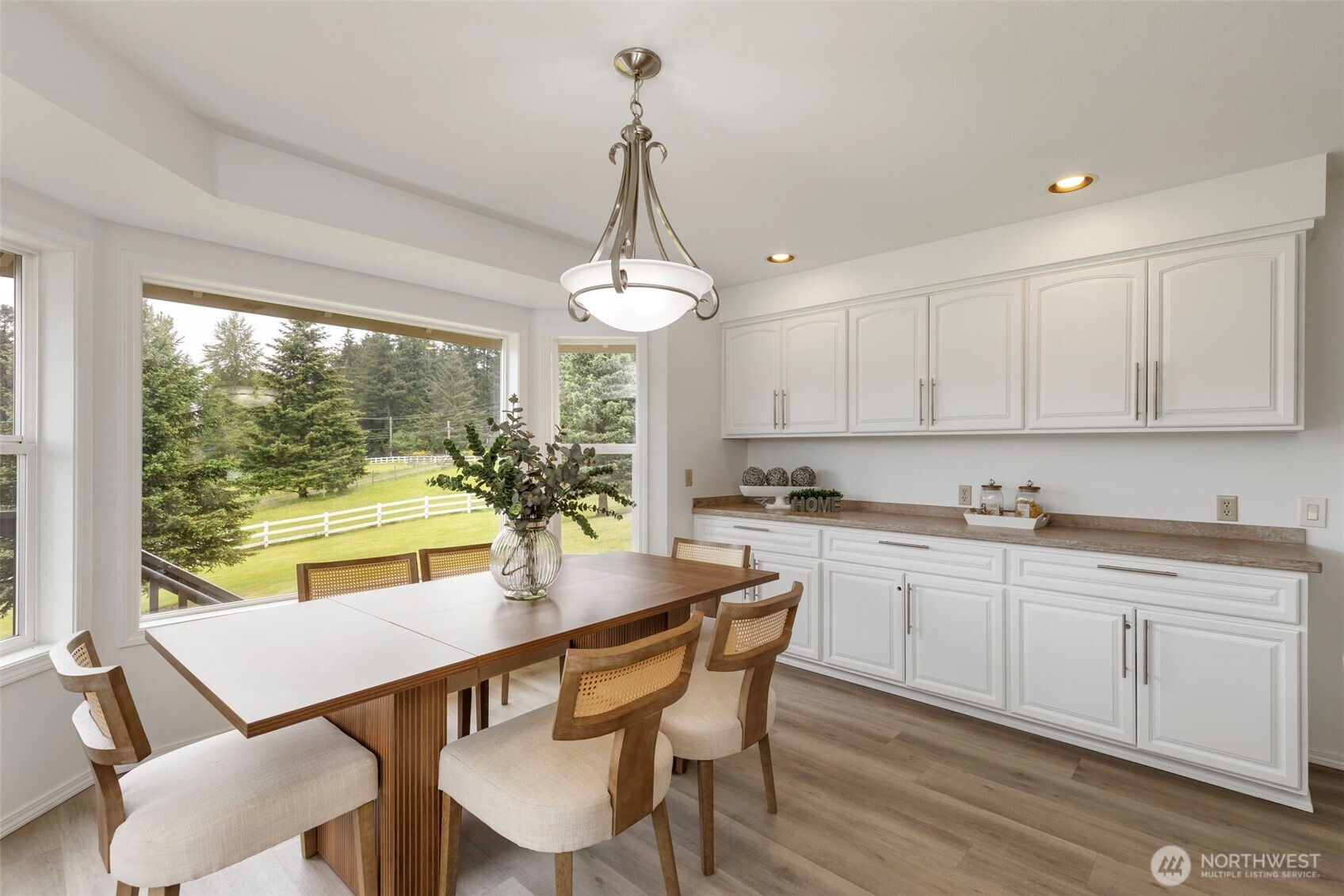 14110 Glenwood Road Southwest Port Orchard, WA 98367 - Photo 12 of 40 a view of a dining room with furniture window and outside view