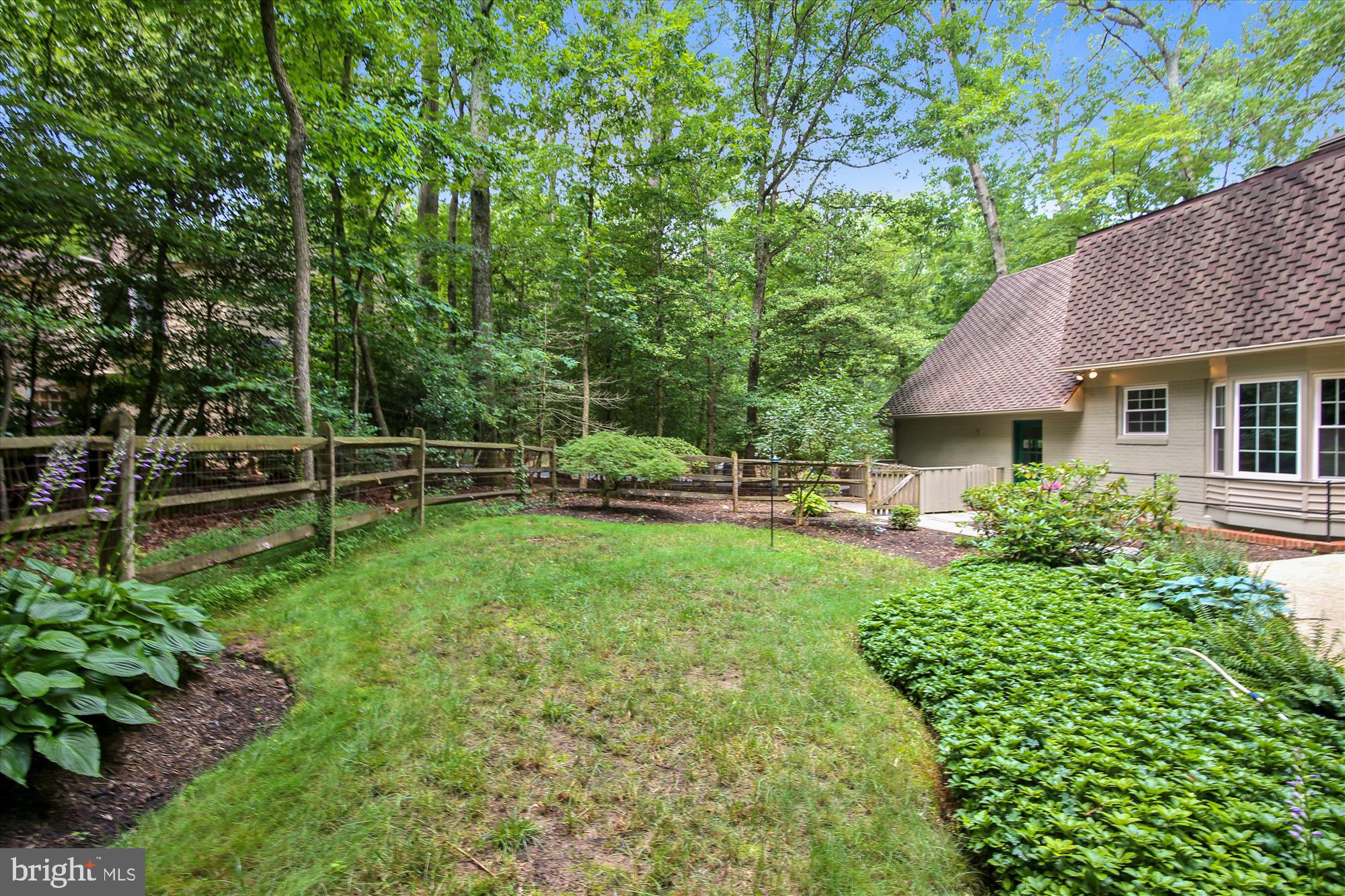 11407 Drop Forge Lane Reston, VA 20191 - Photo 3 of 48 a view of backyard with table and chairs and potted plants