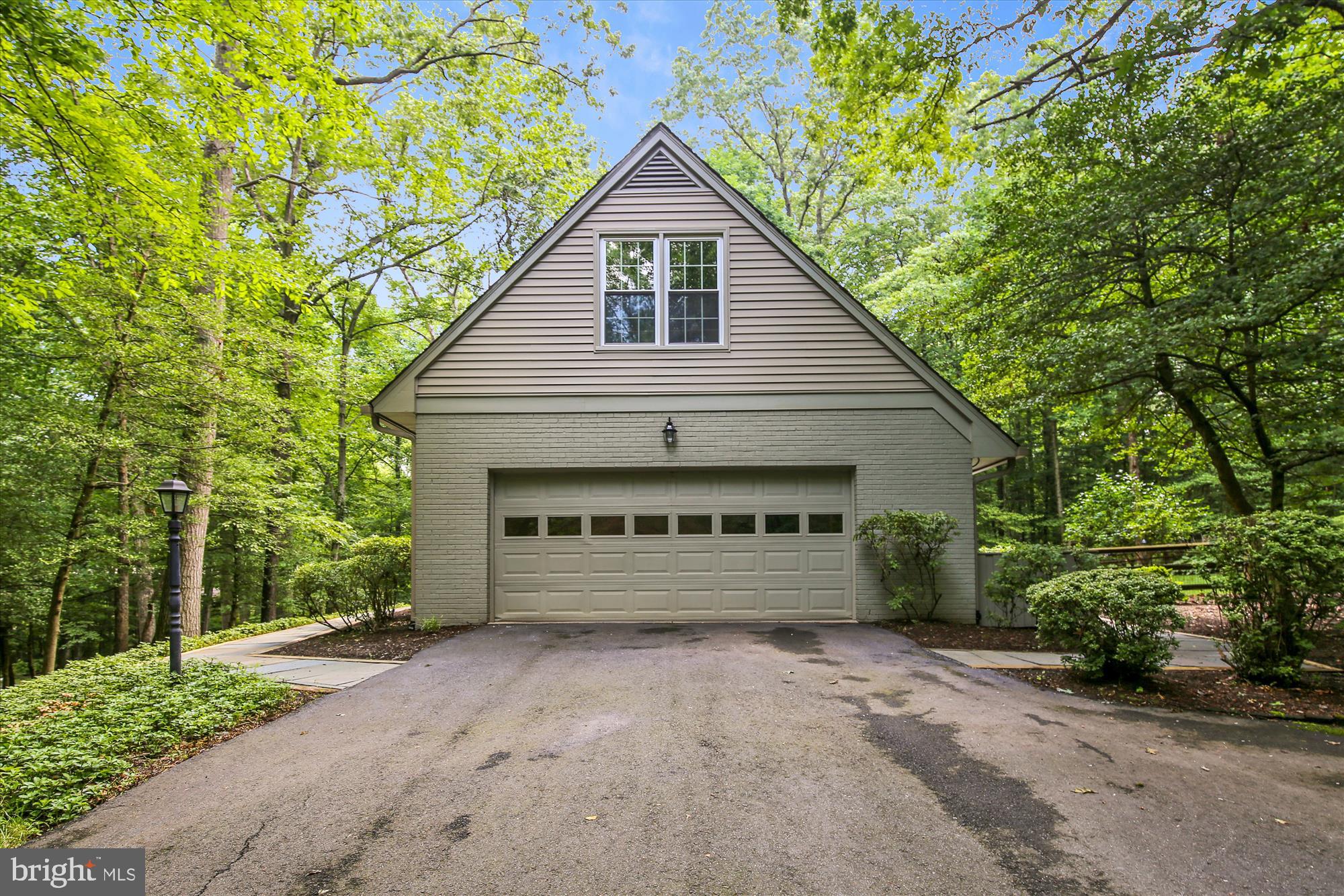 11407 Drop Forge Lane Reston, VA 20191 - Photo 4 of 48 a view of a house with a yard and garage