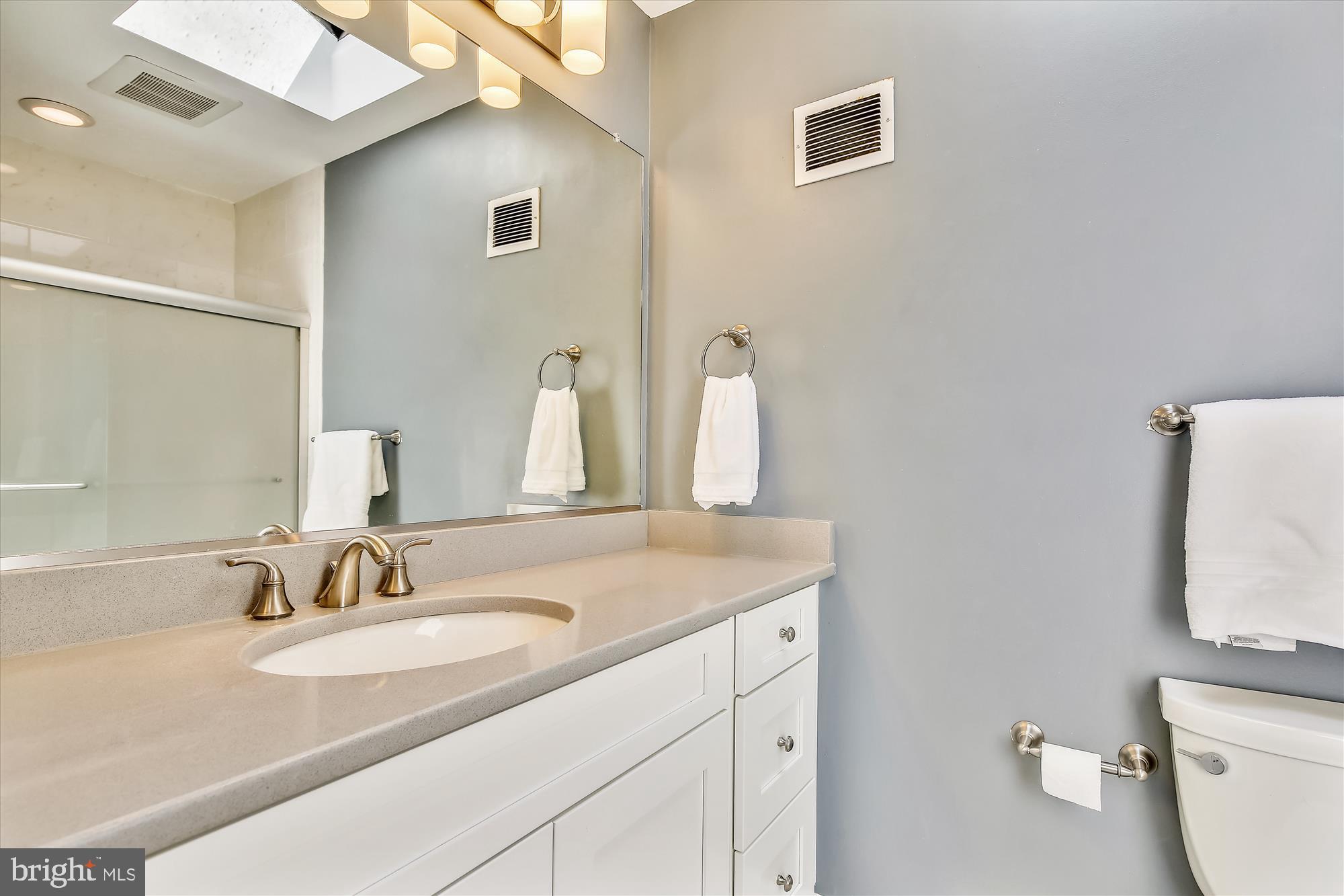 11407 Drop Forge Lane Reston, VA 20191 - Photo 34 of 48 a bathroom with a sink and a toilet