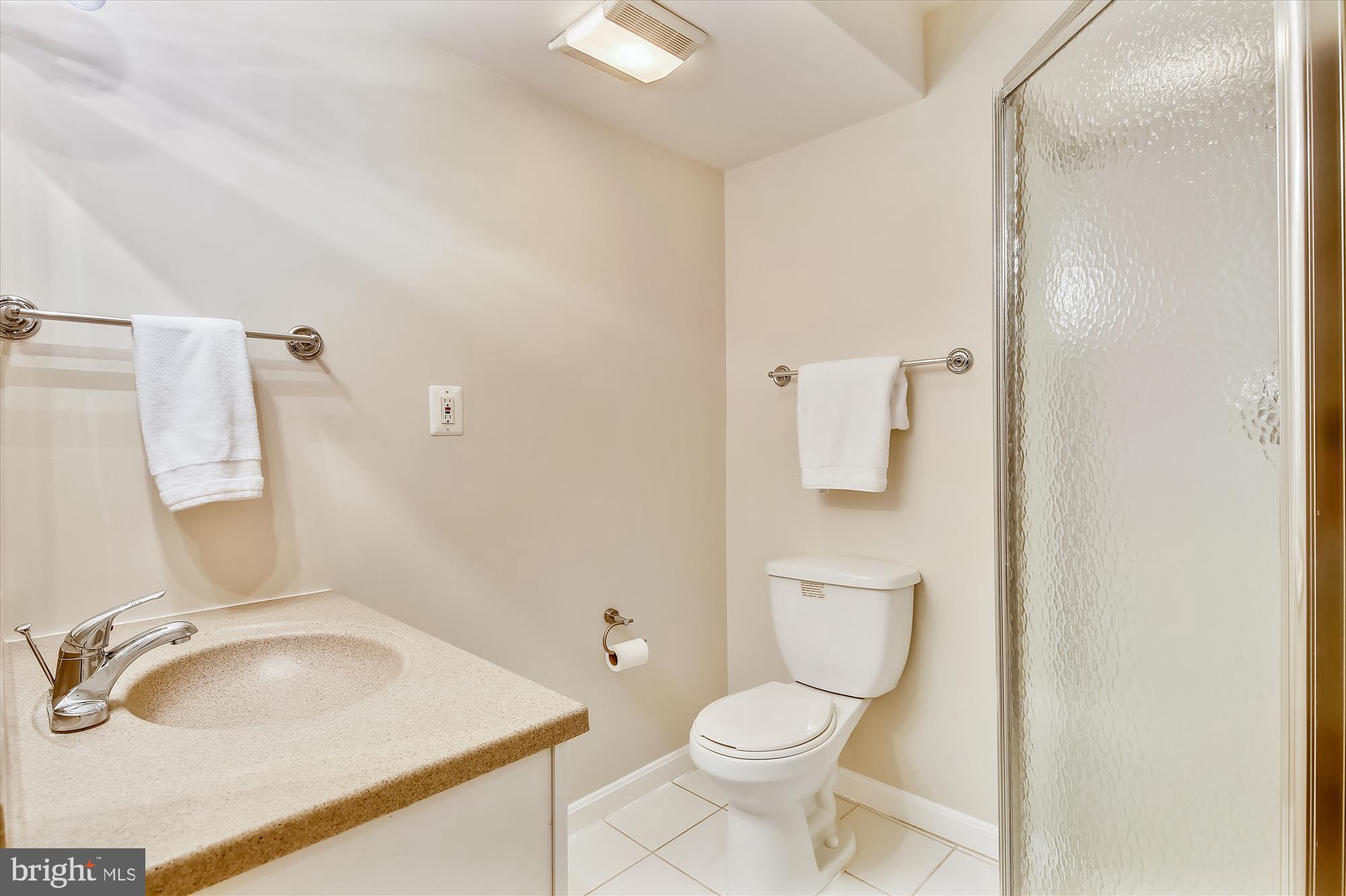 11407 Drop Forge Lane Reston, VA 20191 - Photo 40 of 48 a bathroom with a sink and a toilet