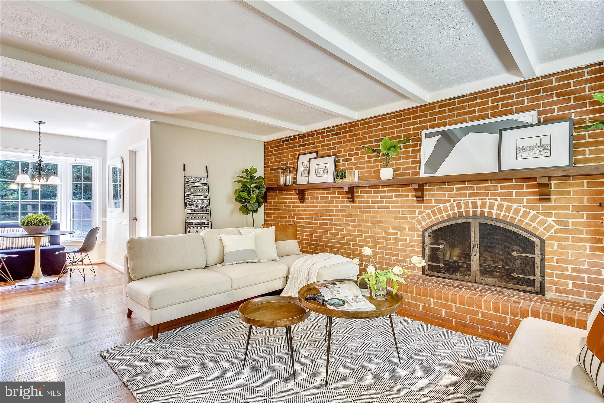 11407 Drop Forge Lane Reston, VA 20191 - Photo 7 of 48 a living room with furniture and a fireplace
