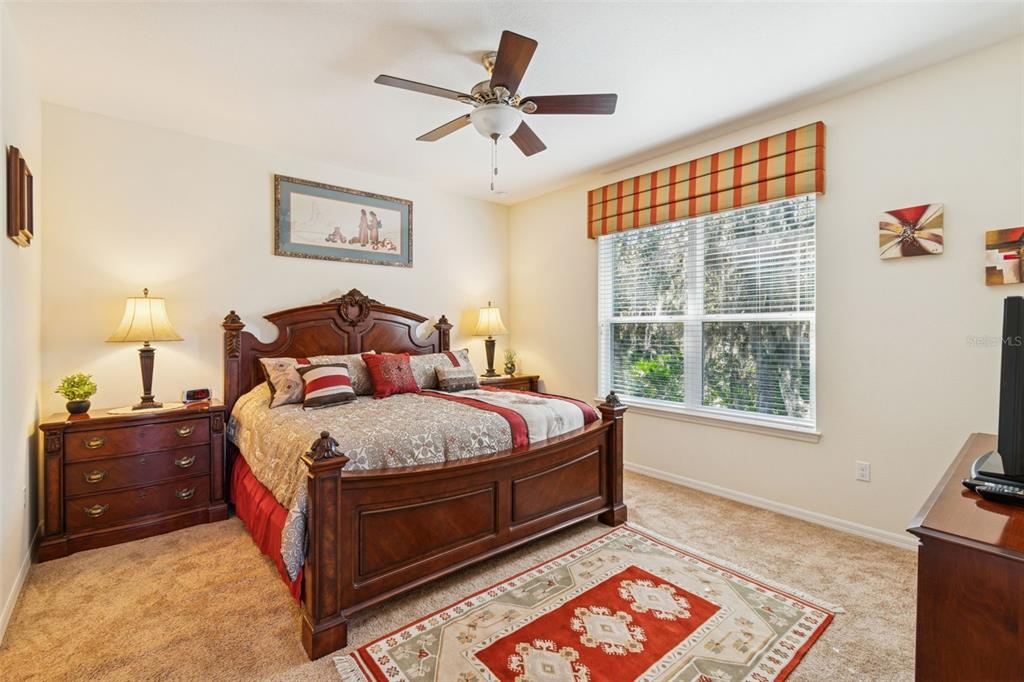 1689 Trabuco Canyon Court Kissimmee, FL 34759 - Photo 20 of 52 a bedroom with a bed and a window