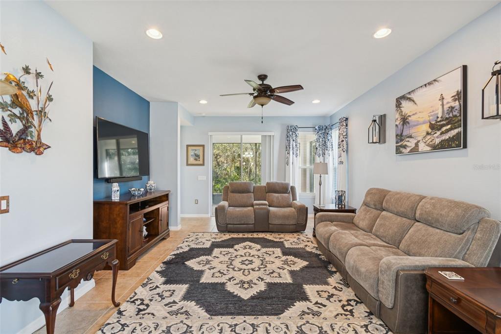 1689 Trabuco Canyon Court Kissimmee, FL 34759 - Photo 6 of 52 a living room with furniture and a window
