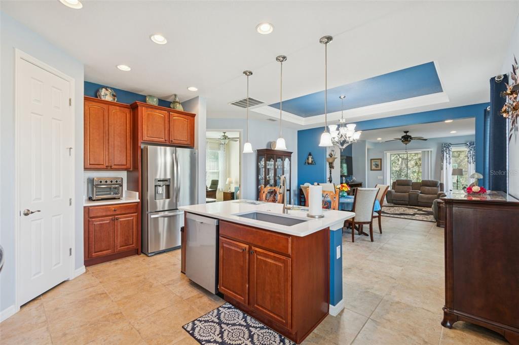 1689 Trabuco Canyon Court Kissimmee, FL 34759 - Photo 9 of 52 a kitchen with a sink appliances and cabinets