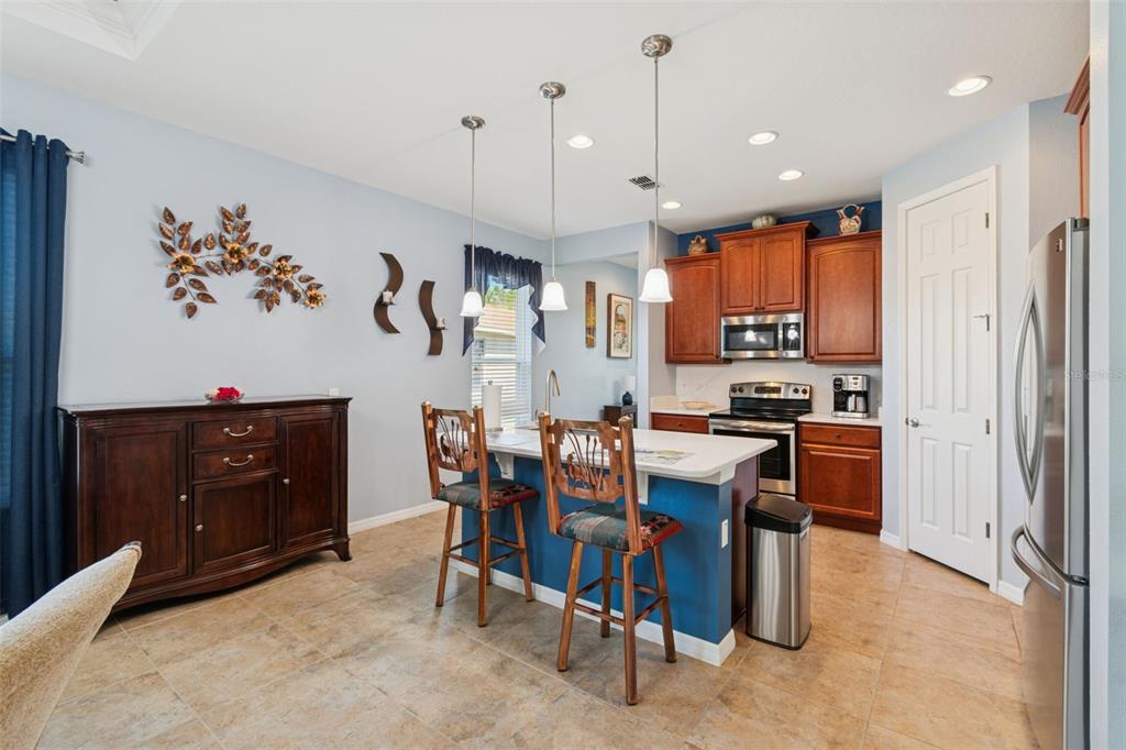 1689 Trabuco Canyon Court Kissimmee, FL 34759 - Photo 10 of 52 a view of a dining room with furniture