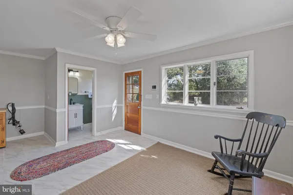 a bathroom with a sink a mirror and a toilet