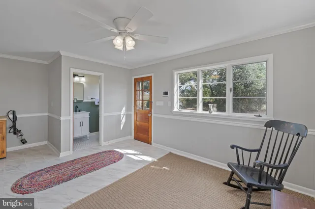 a bathroom with a sink a mirror and a toilet