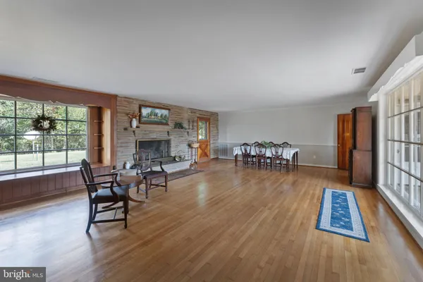 a view of entryway with wooden floor
