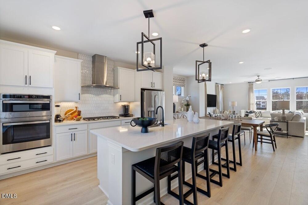 1320 West Garner Road, Unit 101 Garner, NC 27529 - Photo 7 of 27 Greystone - Kitchen and Gathering Room