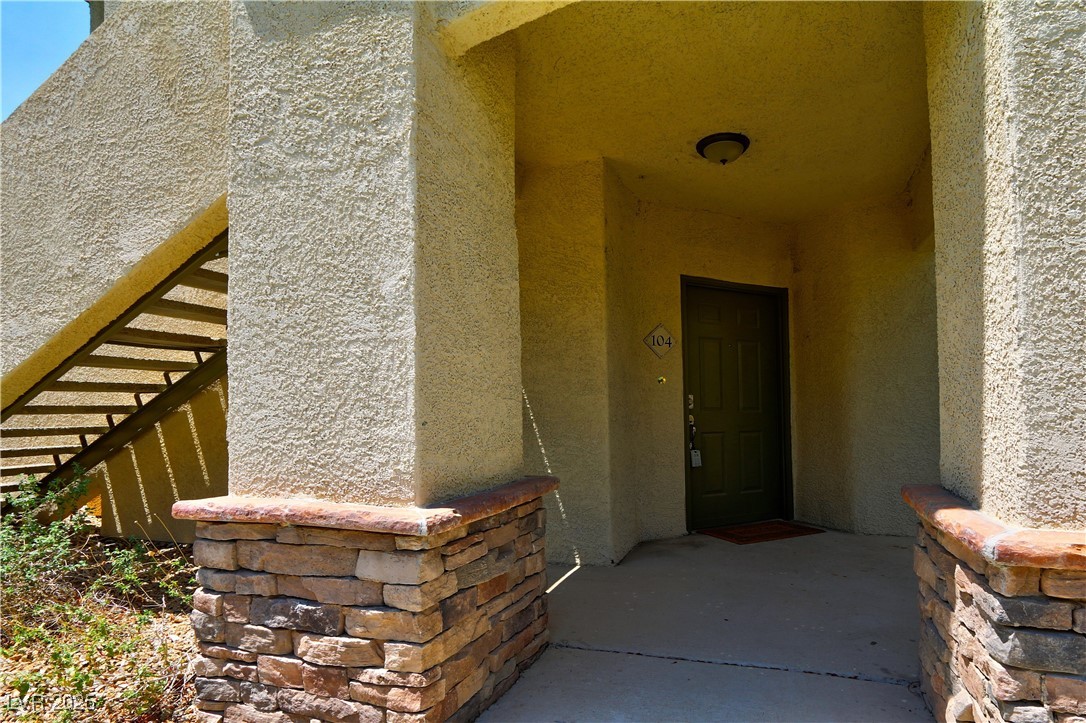 10225 King Henry Avenue, Unit 104 Las Vegas, NV 89144 - Photo 2 of 24 Entrance to property with stucco siding