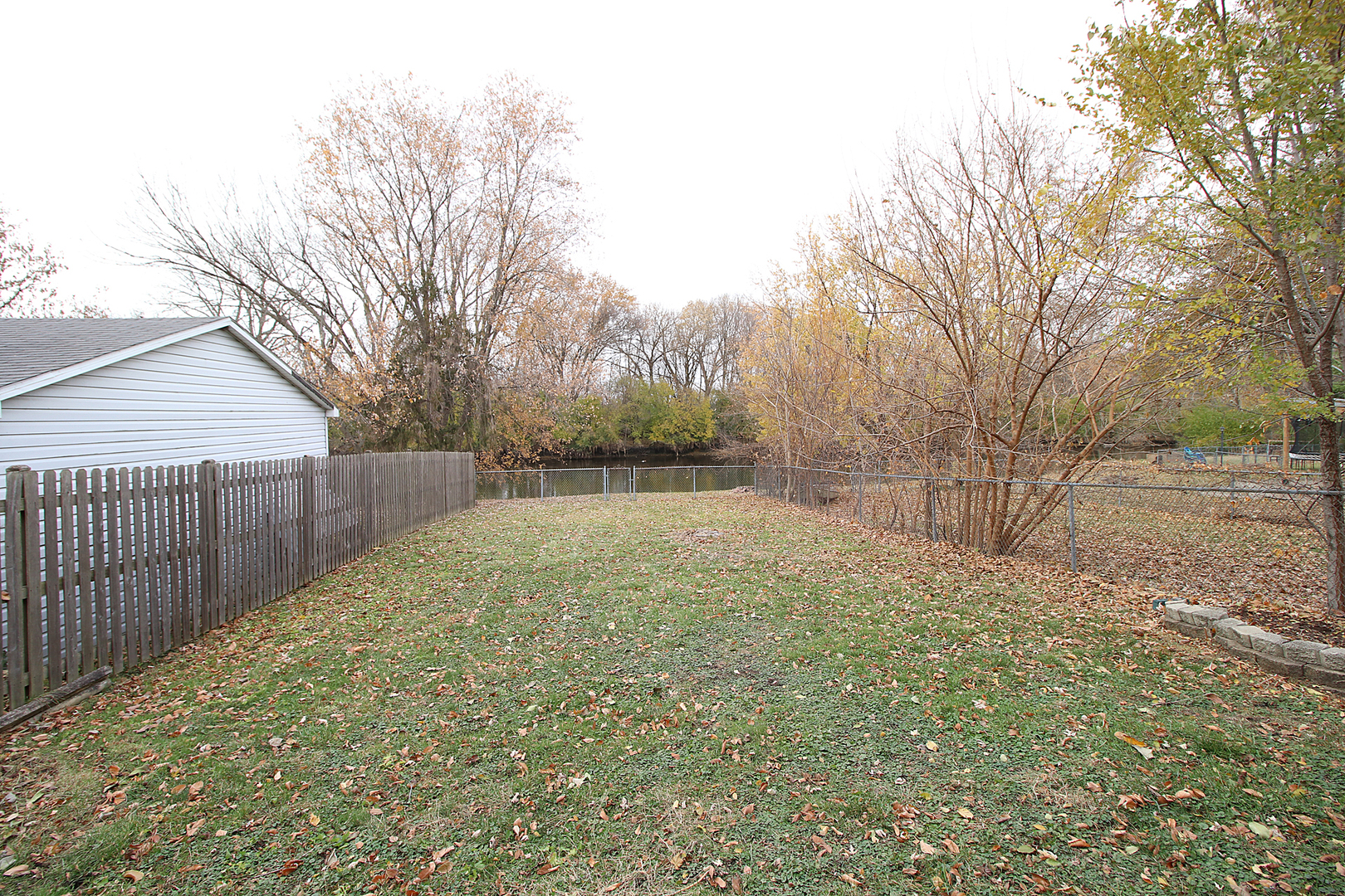 24218 West Main Street Plainfield, IL 60544 - Photo 17 of 19 a view of backyard and tree