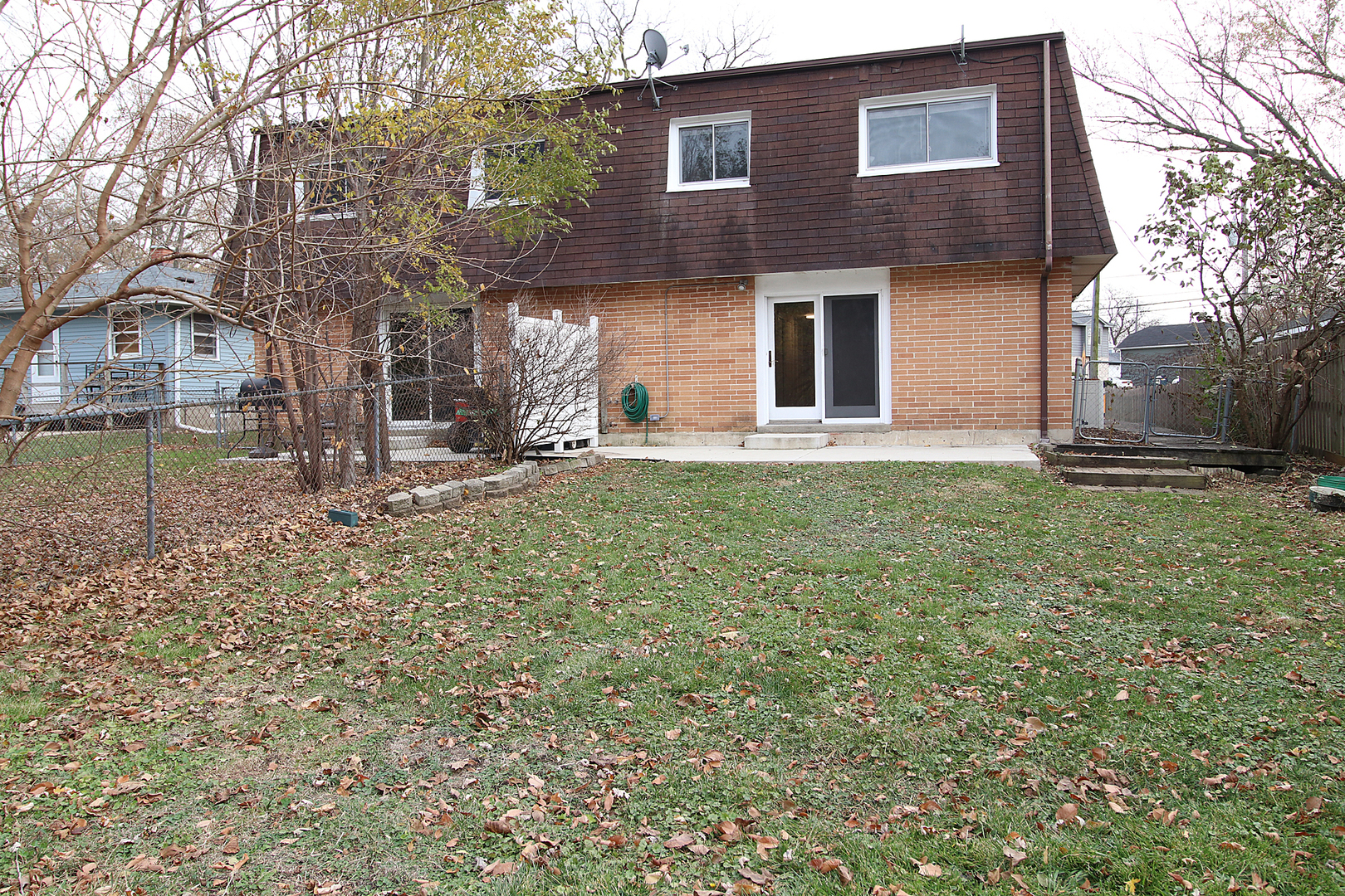 24218 West Main Street Plainfield, IL 60544 - Photo 2 of 19 a front view of a house with a yard