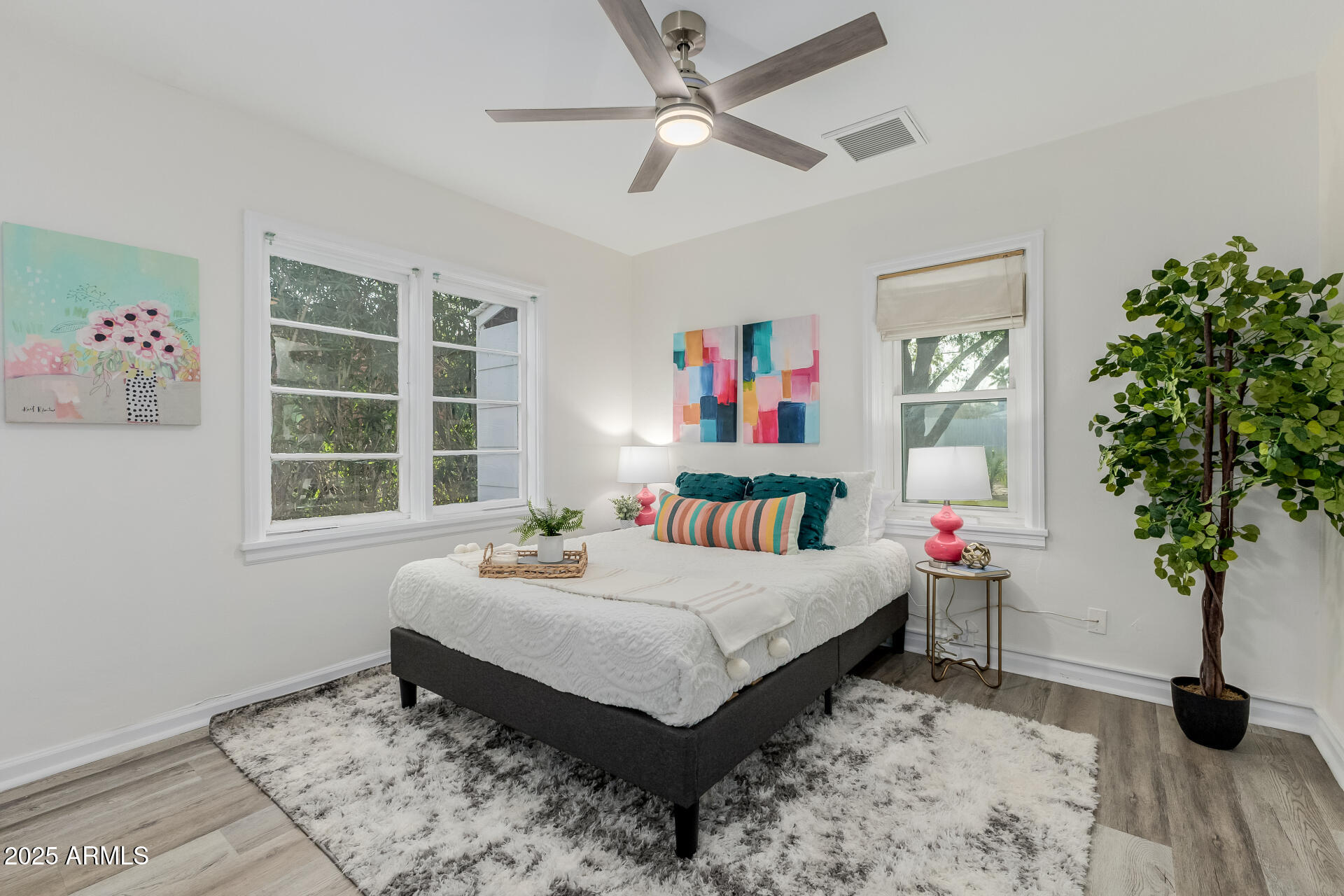 1305 East Granada Road Phoenix, AZ 85006 - Photo 14 of 35 a bedroom with bed and a window