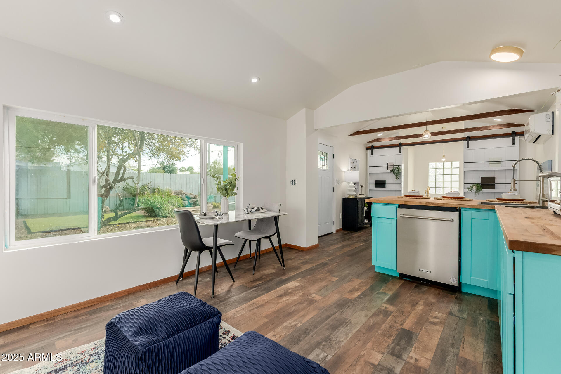 1305 East Granada Road Phoenix, AZ 85006 - Photo 20 of 35 a dining room with furniture and large windows