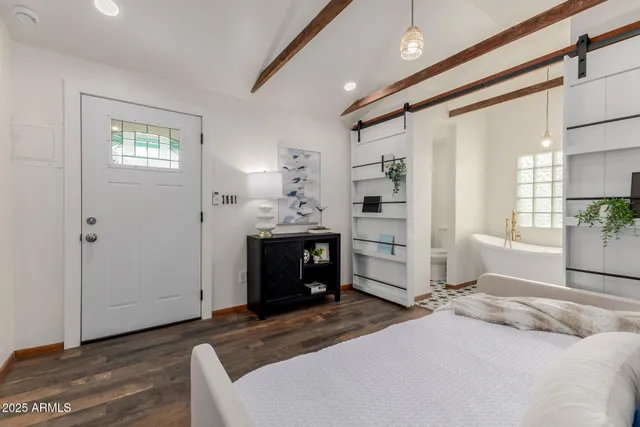 a view of a barn with yard