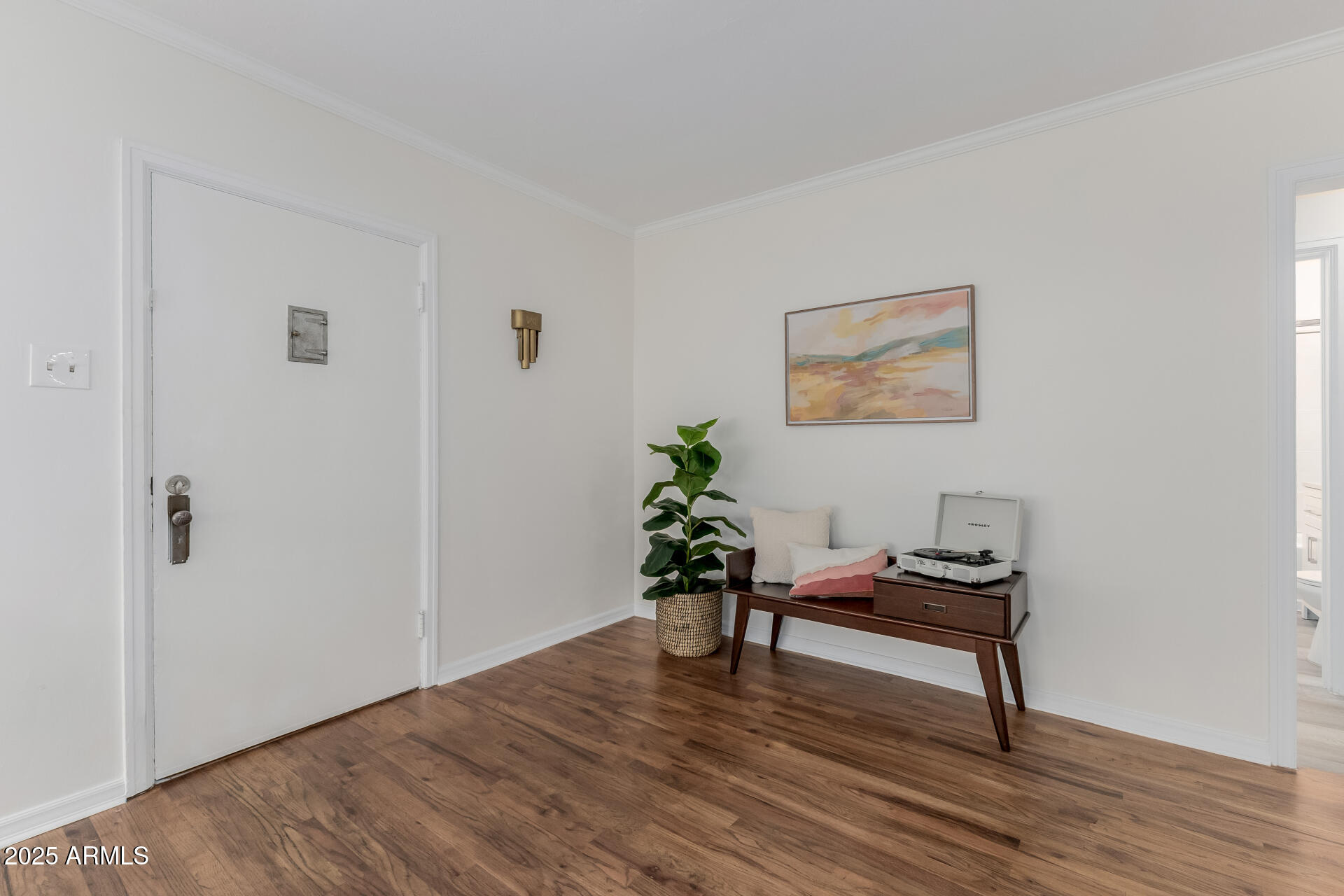 1305 East Granada Road Phoenix, AZ 85006 - Photo 7 of 35 a living room with furniture and a wooden floor