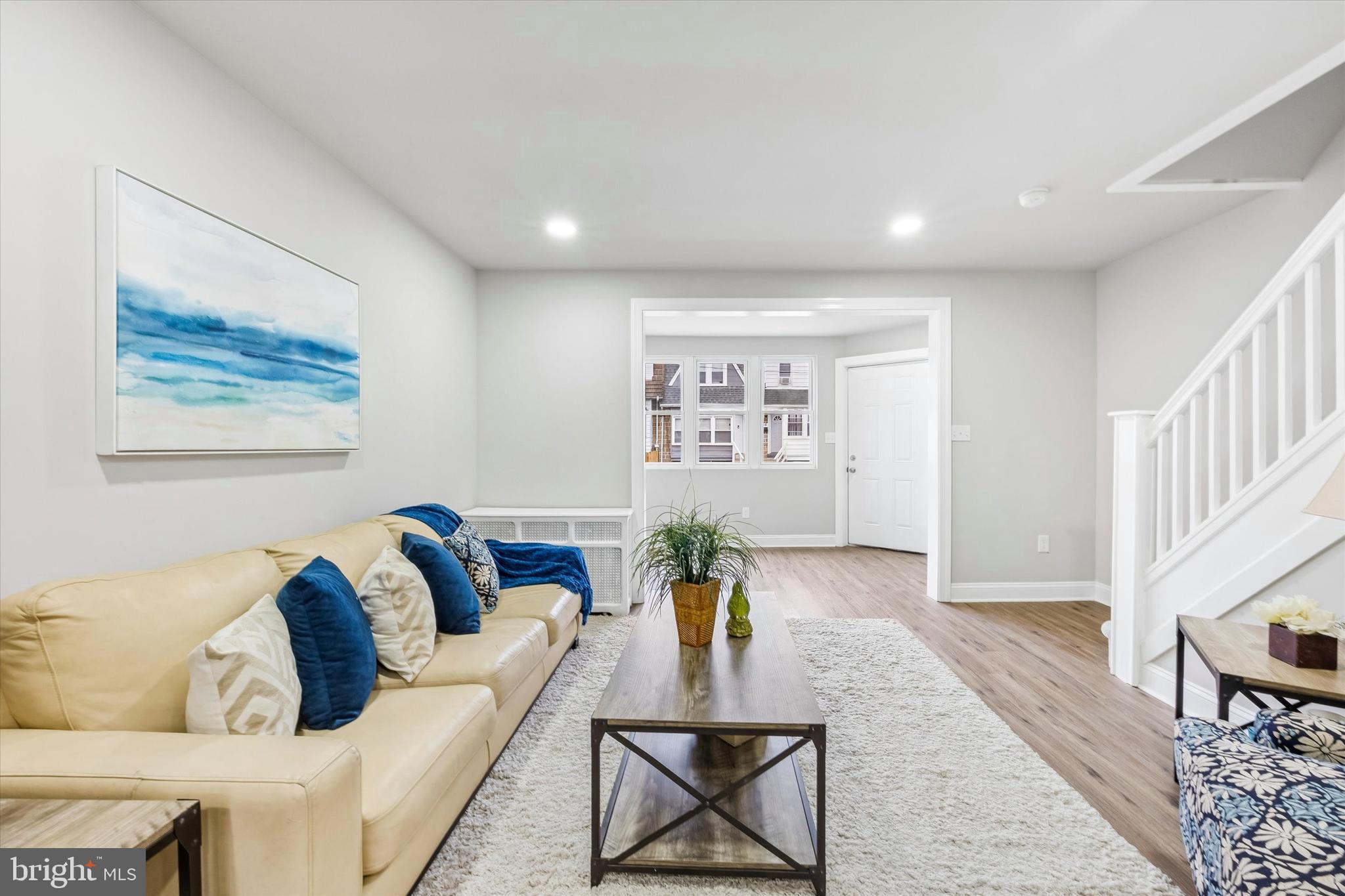 519 Littlecroft Road Upper Darby, PA 19082 - Photo 6 of 12 a living room with furniture and a wooden floor