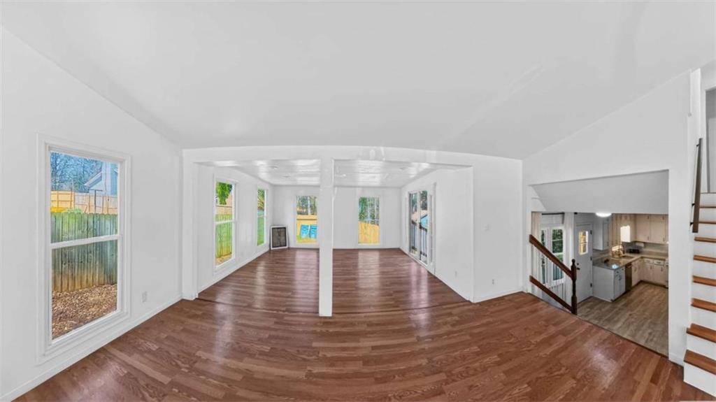 3221 Bromley Rowe Duluth, GA 30096 - Photo 13 of 44 a view of an entryway with wooden floor
