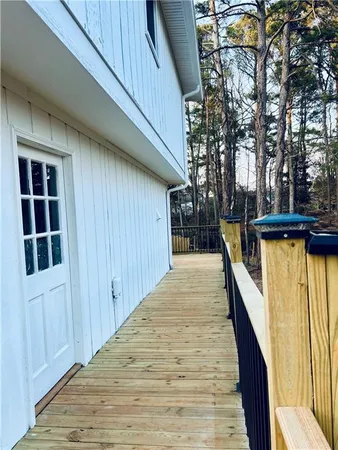 a view of a backyard with wooden floor