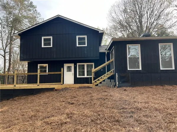 a house view with a garden space