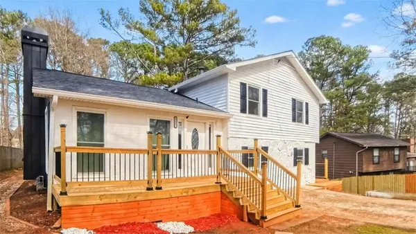 a view of a house with a patio