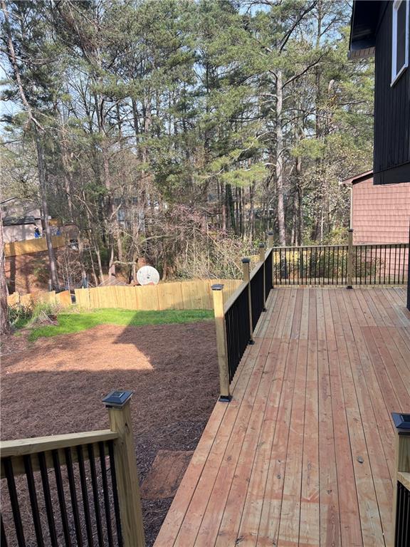 3221 Bromley Rowe Duluth, GA 30096 - Photo 43 of 44 a view of a backyard with wooden floor
