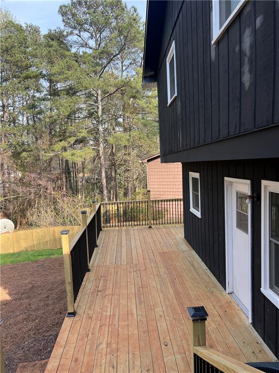 3221 Bromley Rowe Duluth, GA 30096 - Photo 44 of 44 a view of balcony with wooden floor