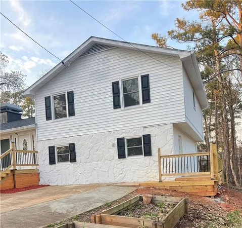 a front view of a house with garage