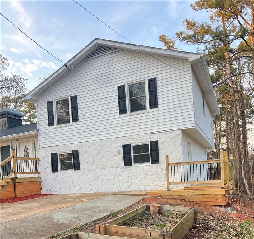 3221 Bromley Rowe Duluth, GA 30096 - Photo 6 of 44 a front view of a house with garage