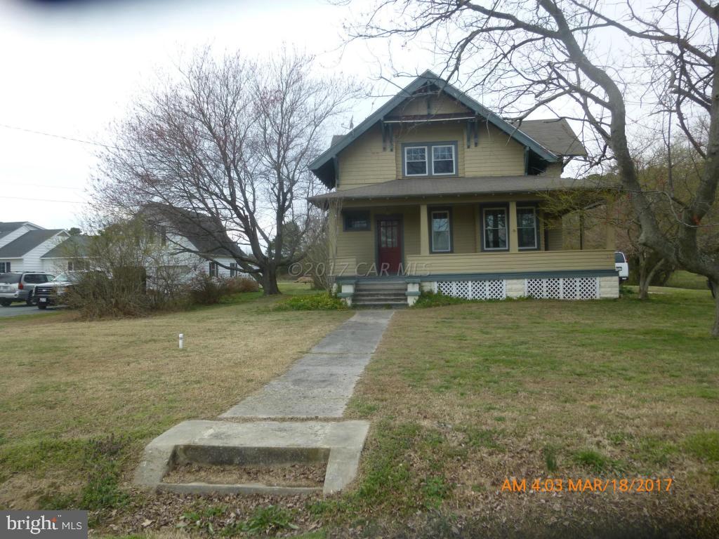 23468 Deal Island Road Deal Island, MD 21821 - Photo 20 of 20 a front view of a house with garden