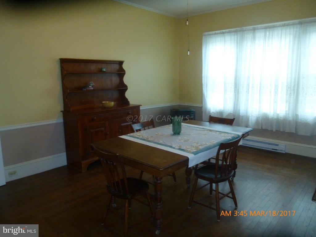 23468 Deal Island Road Deal Island, MD 21821 - Photo 3 of 20 a view of a dining room with furniture and window