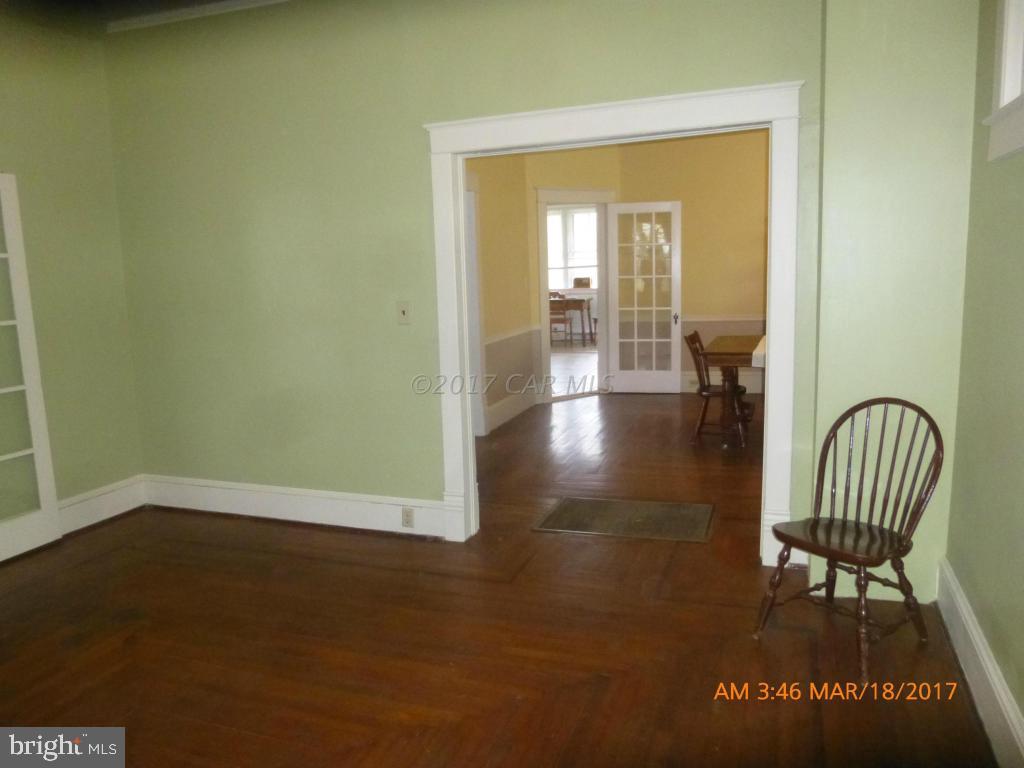 23468 Deal Island Road Deal Island, MD 21821 - Photo 5 of 20 a view of livingroom with furniture and wooden floor