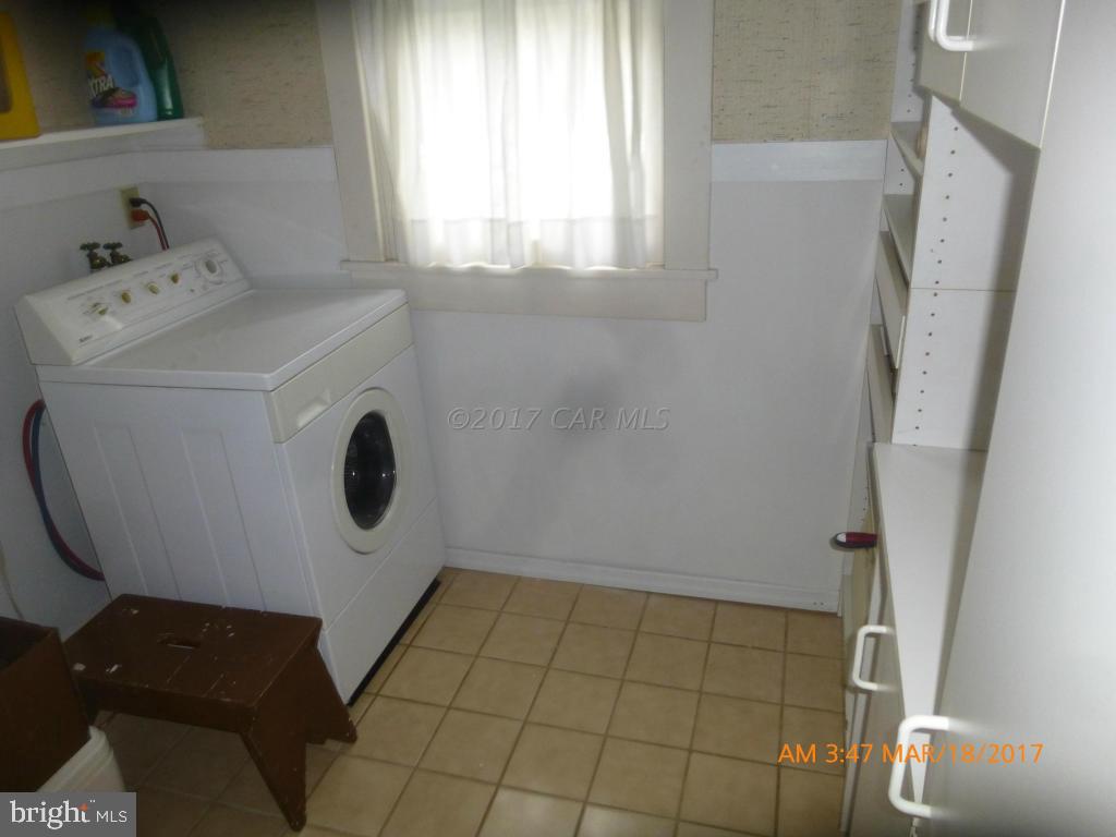 23468 Deal Island Road Deal Island, MD 21821 - Photo 8 of 20 a utility room with dryer and washer