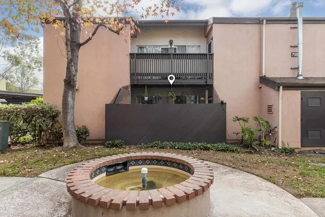 a view of swimming pool from a outdoor space